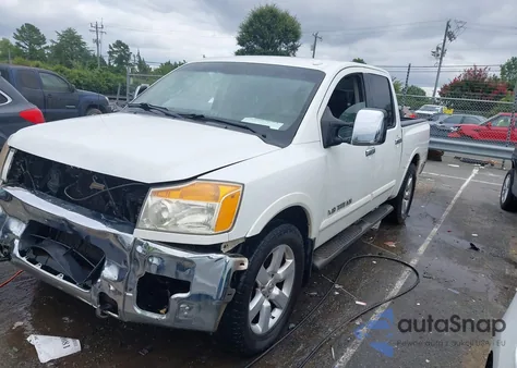 2012 Nissan Titan Sl z USA, uszkodzony, nr VIN 1N6BA0ED2CN327716